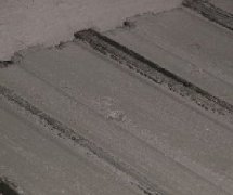 萝卜AV视频砌塊生產線的刮漿裝置